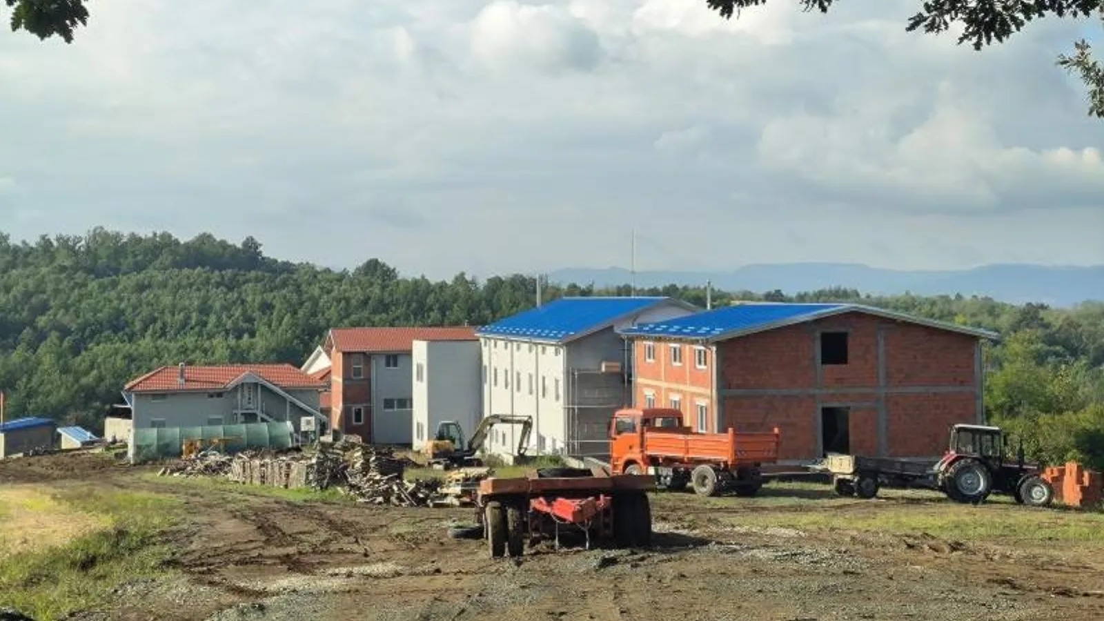 Srezojevci mountain site with local factories, clinics, and hotels served by the microgrid